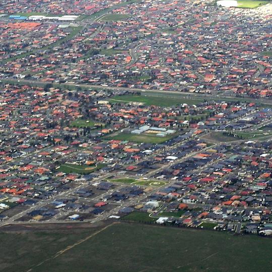 Hillside Victoria aerial photo from north west. The Calder Park Drive cuts off the top left corner, is the eastern boundary of Hillside suburb. The southern boundary is behind the reservoir